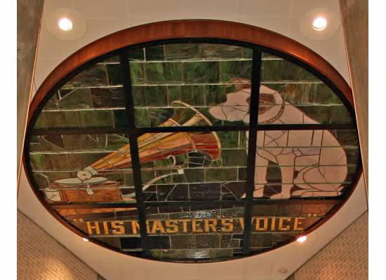 An image of the Little Nipper stain glass window in the library