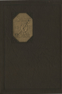 (e.g., PMC 1927 Yearbook Cover dark background with gold emblem on the left with "Sabre & Sash" inside))